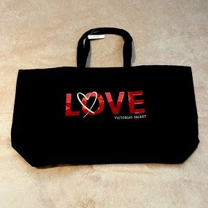 Victoria’s Secret black canvas bag.